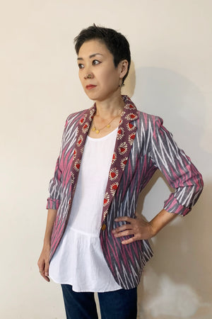 Light cotton Ikat blazer jacket of well-matched pale pink, light grey, and dull purple colour pallette. Curvy jacket based on women's body pattern. Shop online!