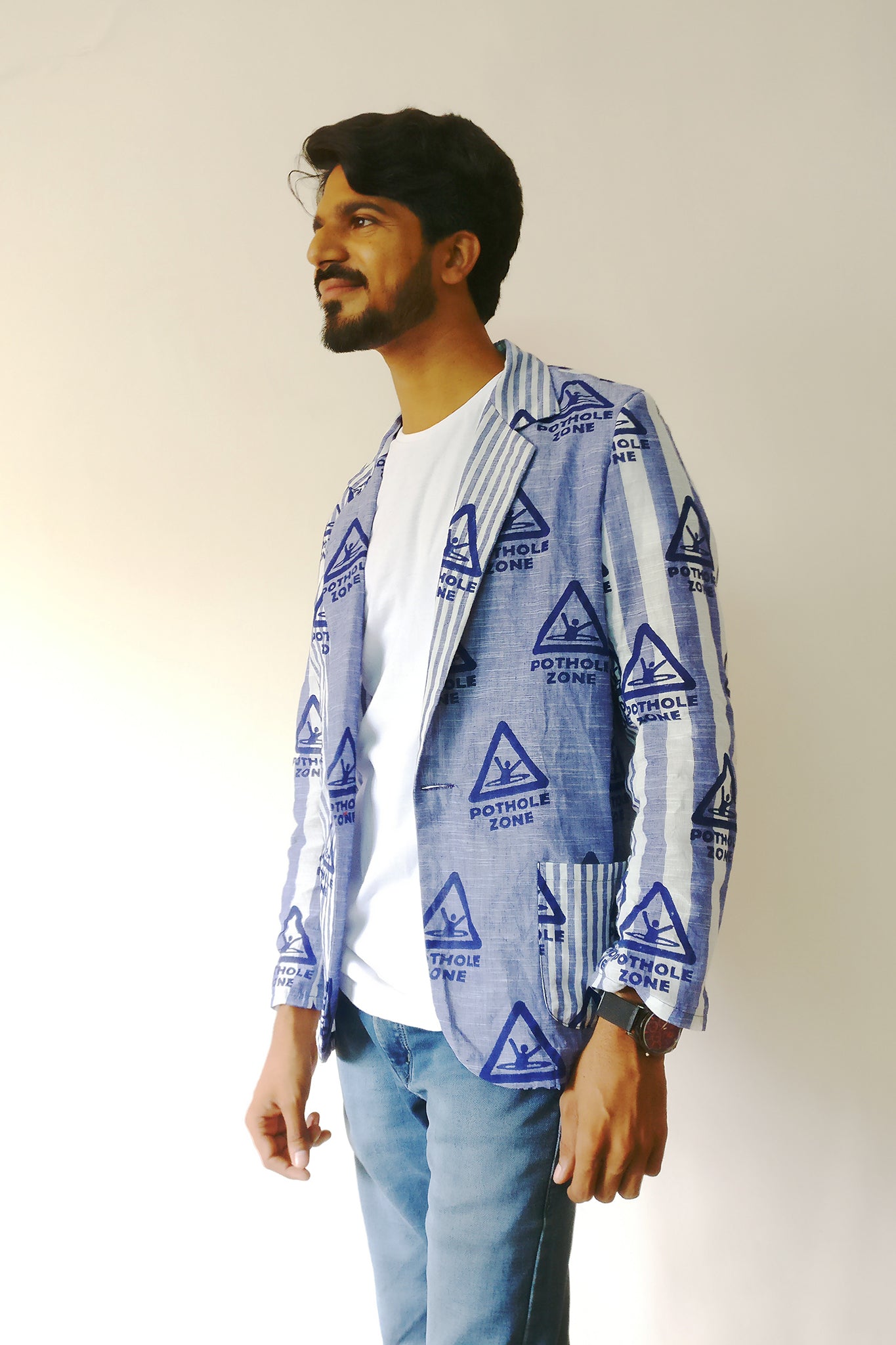 Wear your love for Bombay Meri Jaan. This time we talked about potholes. Men's Blazer Jacket with our original print on very cool handloom stripe cotton fabric. Shop online and survive the crazy Mumbai monsoon!
